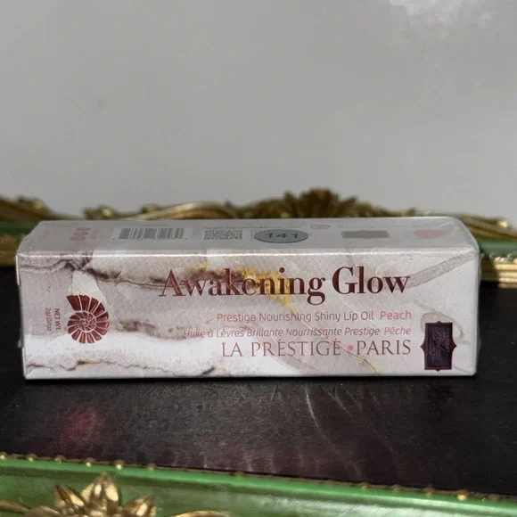 Awakening Glow Peach Lip Oil - Retail $120